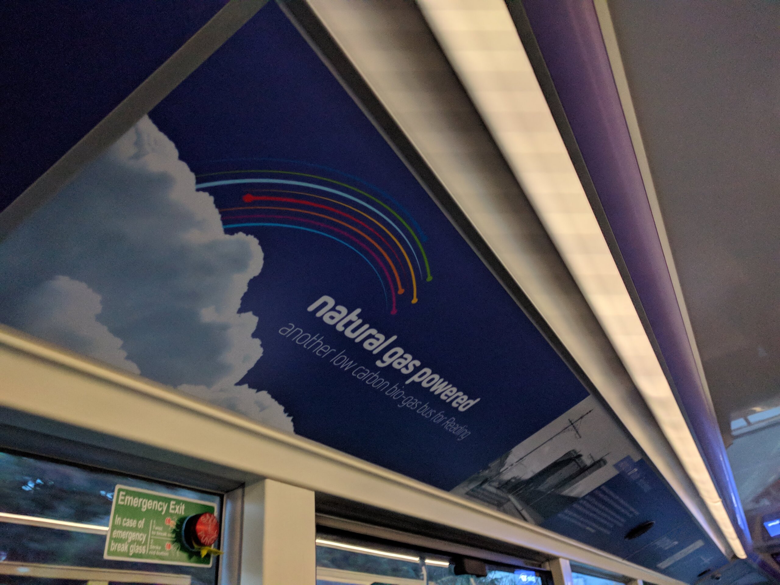 A coving panel on board the purple 17 buses advertising the natural gas engines